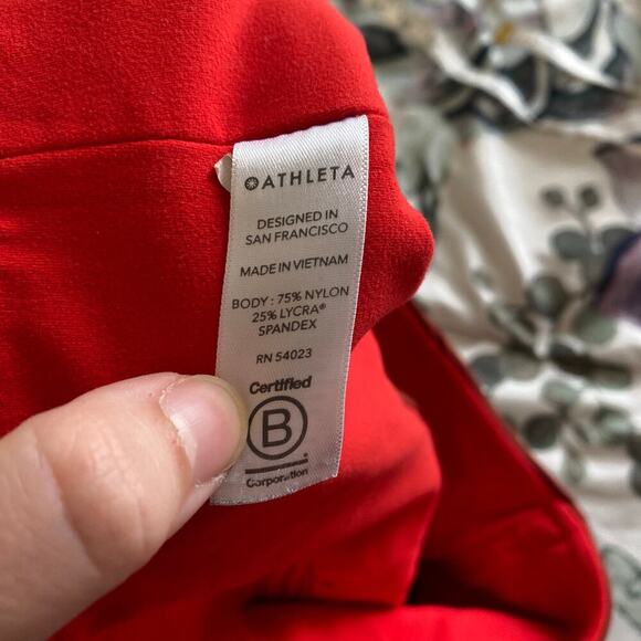 ATHLETA It's A Wrap 7/8 Tight Small Leggings Warm Orange Perforated Powervita - Picture 8 of 9